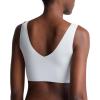 imageCalvin Klein Womens Invisibles Comfort Seamless Lightly Lined V Neck Bralette BraPlein Air W Ivory Logo