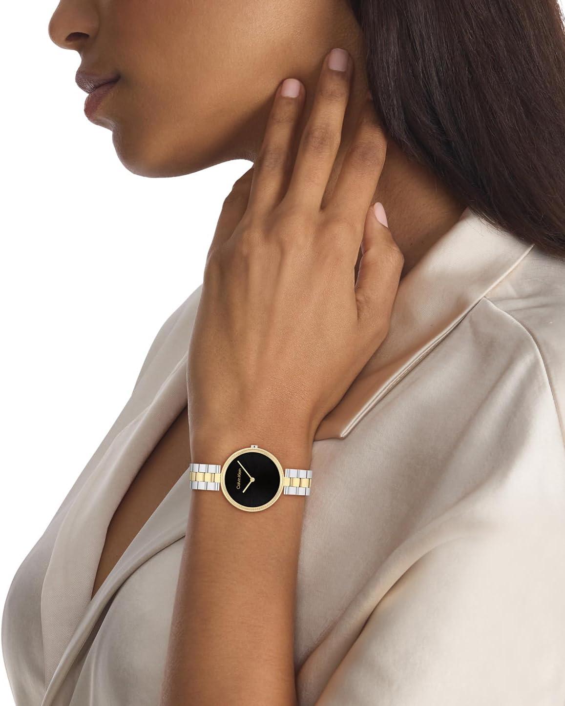 imageCalvin Klein Gleam  Womens 2H Quartz Watch Stainless Steel  Water Resistant 3 ATM30 Meters  A Timeless Elegance for Her Everyday Lifestyle  32 mmTwo Tone