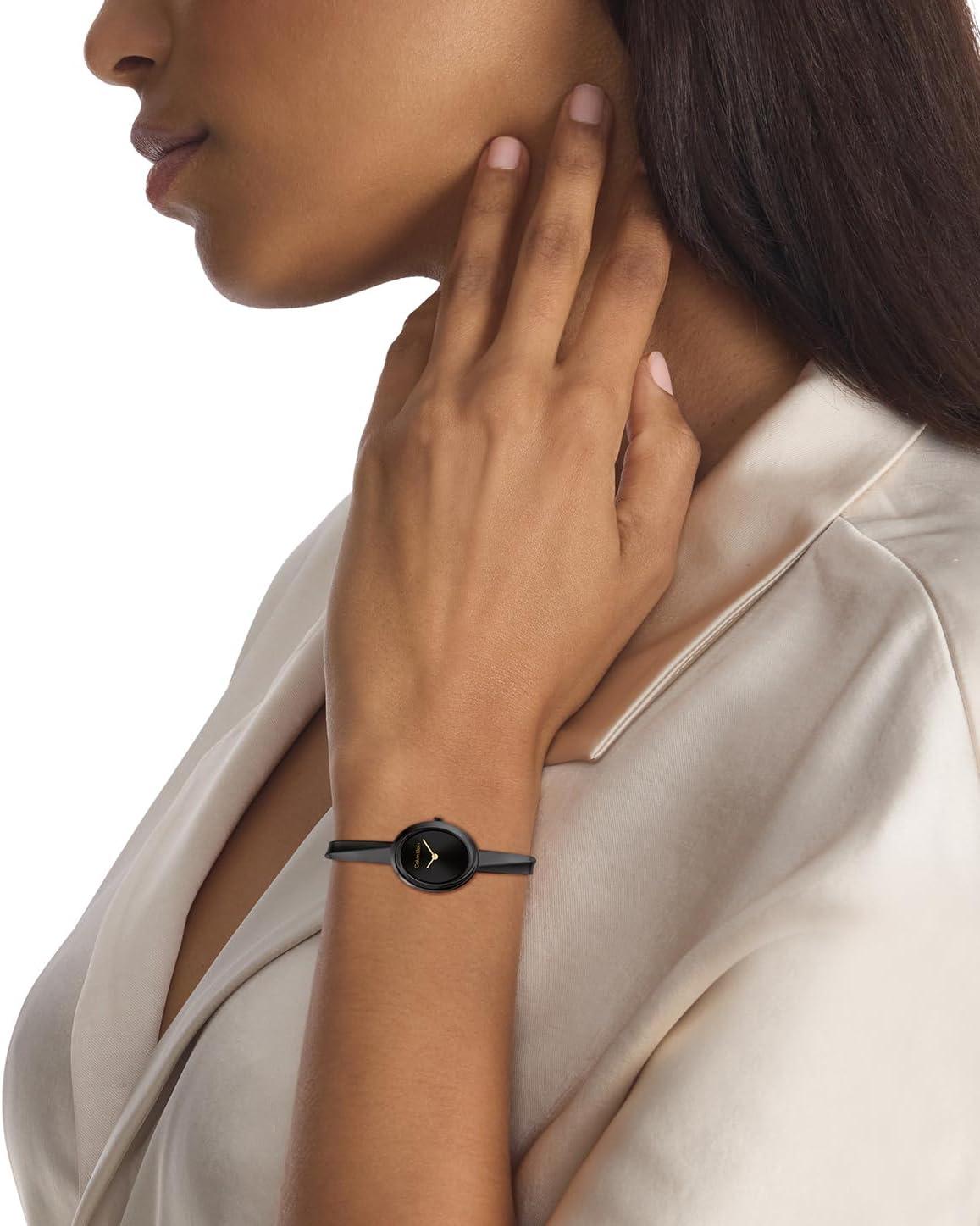 imageCalvin Klein Womens Twisted Bezel Bangle  24mm 2H Quartz Mini Watch  Stainless Steel Bangle  Stylish Comfortable Timepiece  Gift for Her